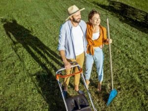 Couple prepares to replace lawn with eco friendly and sustainable lawn alternative